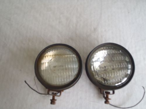 Signal stat 4 1/2&#034; pair of tractor lamps rubber bezel  w bracket