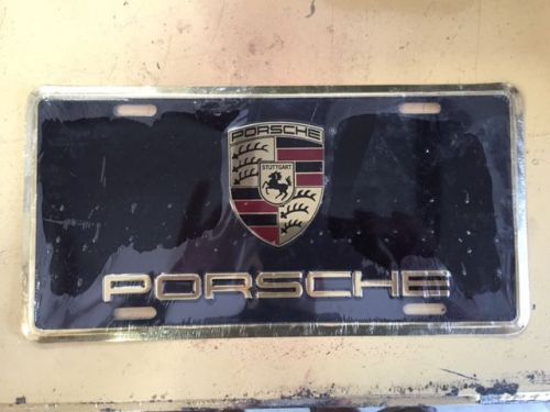 Pna701005 - porsche crest front license plate; new sturdy aluminum gloss finish