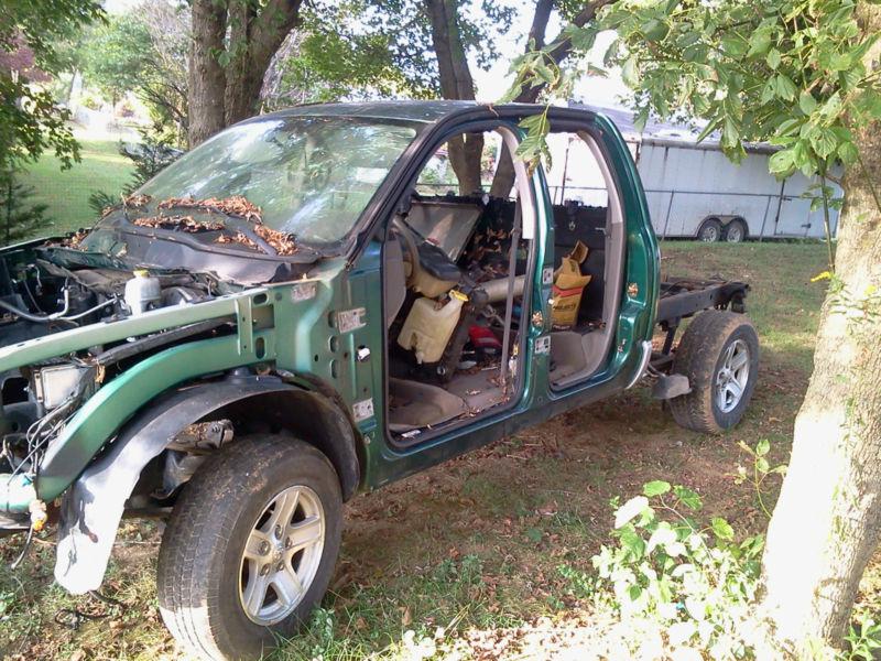 2003 dodge ram rolling chassis. wheels rear end cab frame &&  clear paper work!!