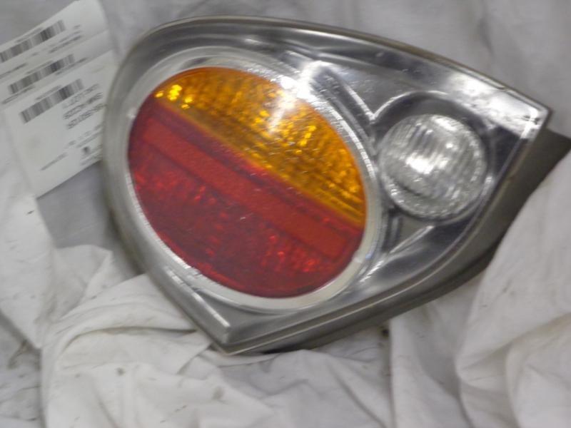 02 03 nissan maxima r. tail light qtr mtd