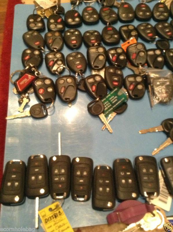 Big lot of 77 smart key fobs chevy gm cadillac tahoe etc car truck suv nr!  