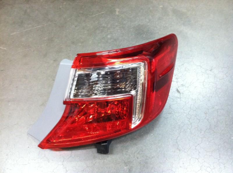 Passenger's side outer taillight brake light for 2013 toyota camry hail damage!