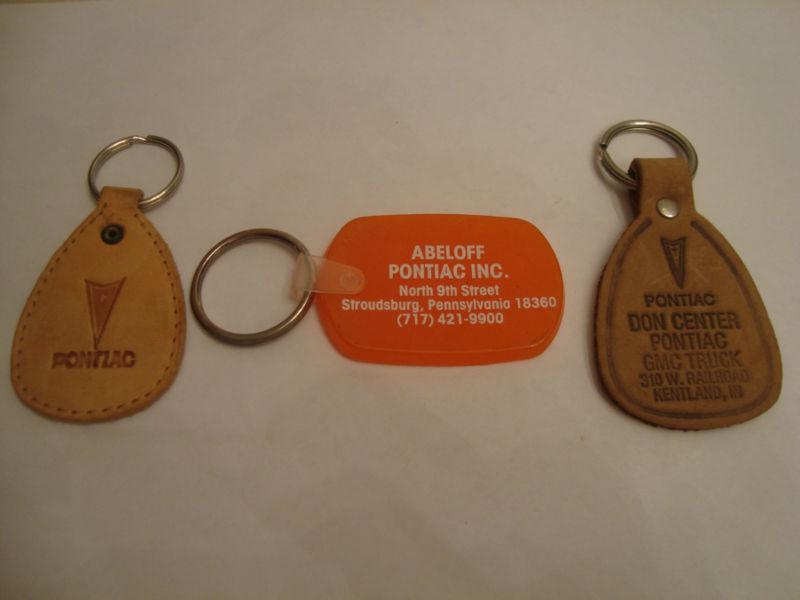 (3) pontiac keychains-knoxville,tn/kentland,in/stroudsburg,pa - 2 are leather!