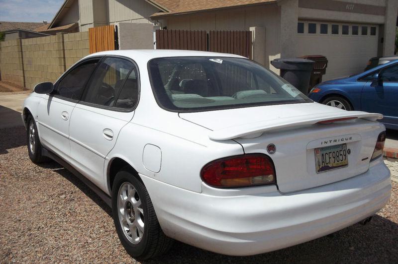 2000 oldsmobile intrigue window glass-left rear, driver's side rear--used