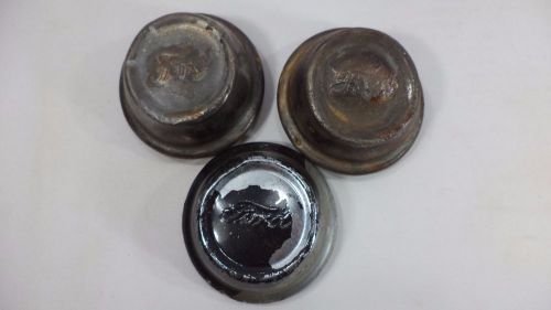 Ford model a t lot of 3  hub caps, grease cup original, scripted wheel cover