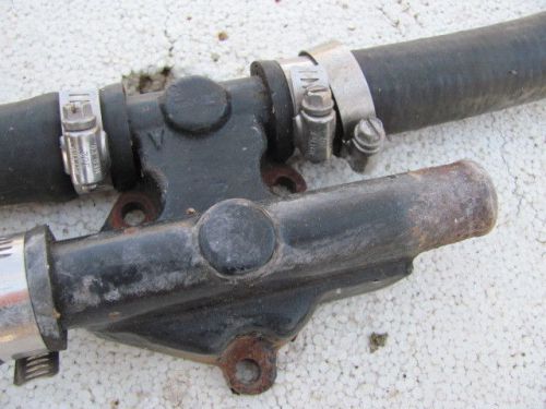 Mercuiser 302 thermostat housing with hoses 1976