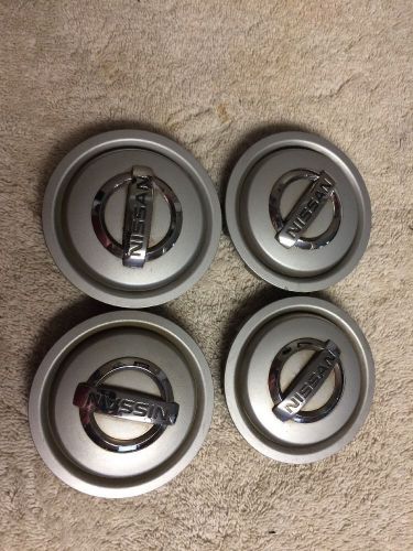 02 03 2004 nissan pathfinder silver oem center cap p/n 40342-5w510 set of 4