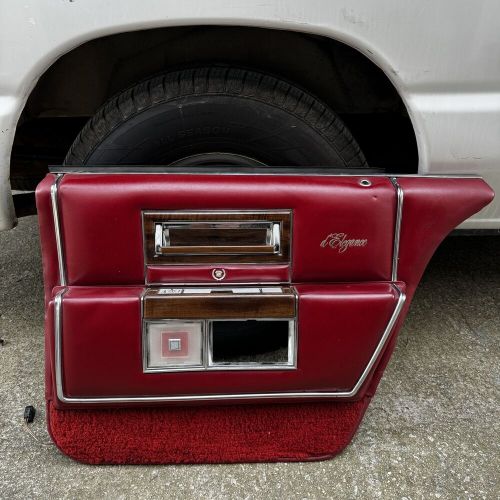 1987-1991 cadillac brougham front right passenger side interior red door panel