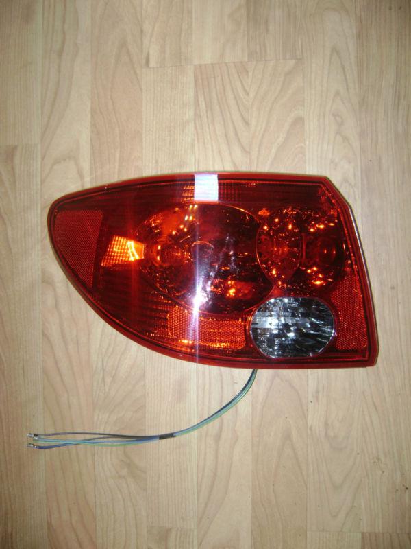 2003-04-05 saturn l200 / l300 sedan - oem left tail light