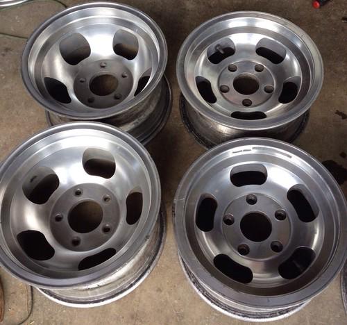 Set of 4 slotted staggered 15x8.5 15x7 western wheels 5 slot 5 on 5.5 bolt