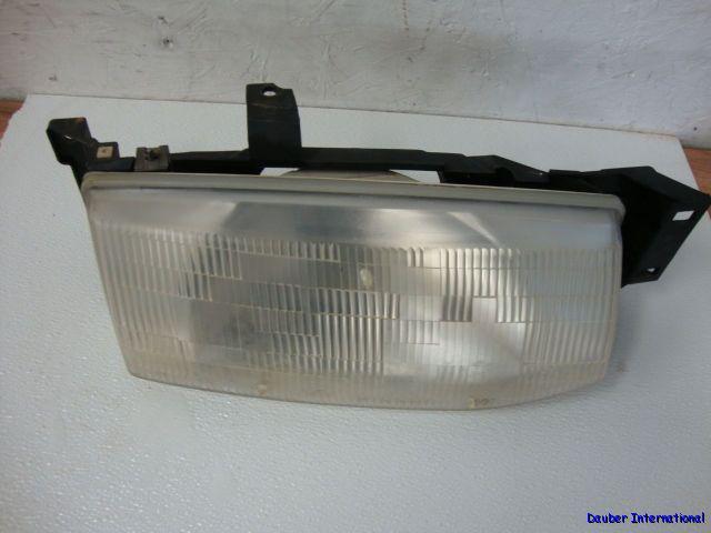 1995 ford escort sedan passenger side headlight oem