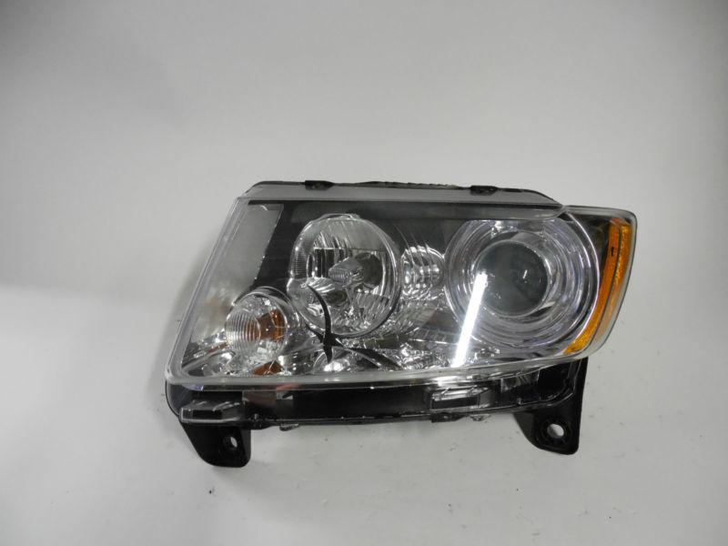 2011 212 2013 jeep grand cherokee oem left xenon headlight nice!