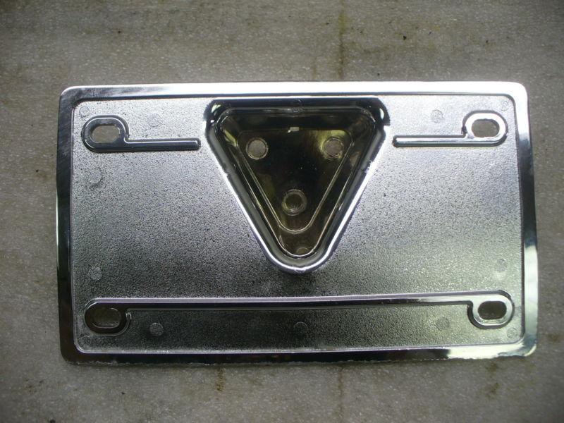 Harley chrome license plate bracket, 7 1/4"  x  4 1/4" .