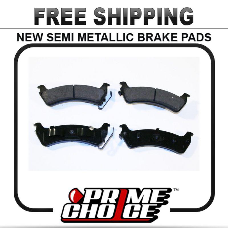 New premium complete set of rear metallic disc brake pads with shims