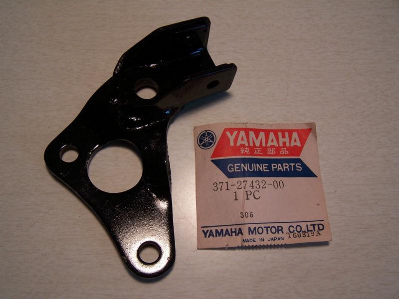 Yamaha footrest peg bracket (right)  tx500  xs500  new old stock