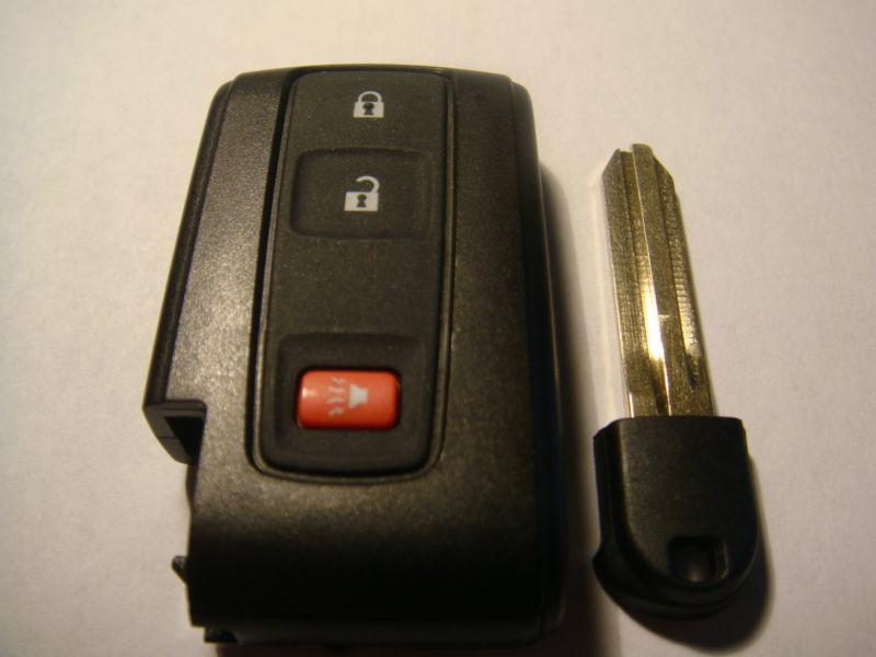 1 used 04-09 toyota prius smart key fob with silver logo mozb31eg with uncut key