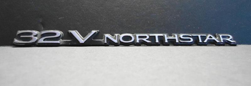 Used genuine gm cadillac "32 v northstar" script emblem 03538464 from 1992-2003 