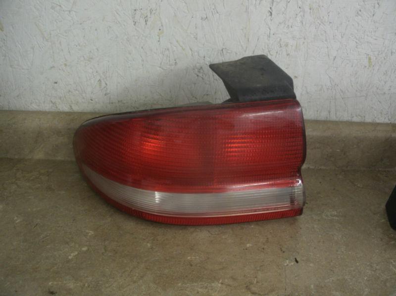 94-97  concorde oem left/ driver tail light