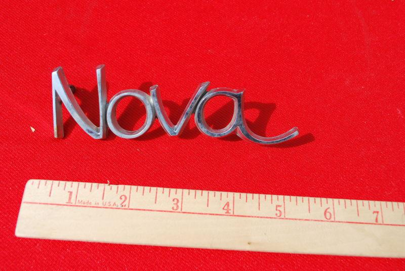 Vintage 1968 chevrolet nova quarter panel emblems - 3943200  polishes up nicely!