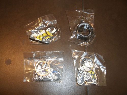 Lot of 4 , michelin key chains, tire, dirt bike, road race, cruiser