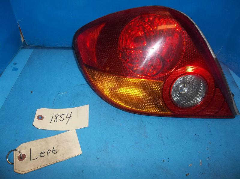 Hyundai tiburon left taillight (qtr mtd) 03 04