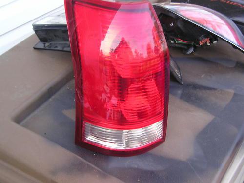 02-07 saturn vue left tail light oem original!