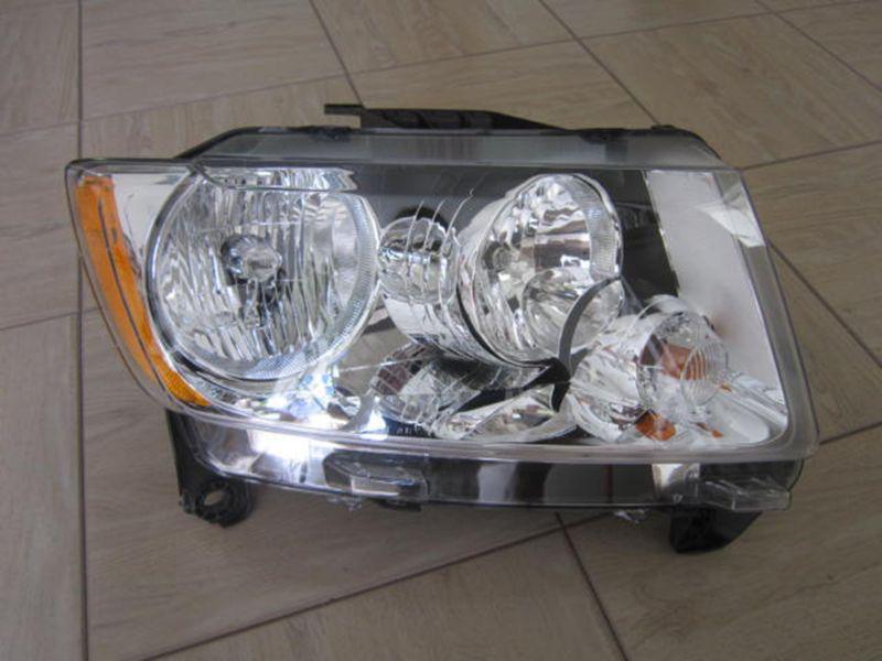 Jeep grand cherokee head lamp  right side - genuine oem part