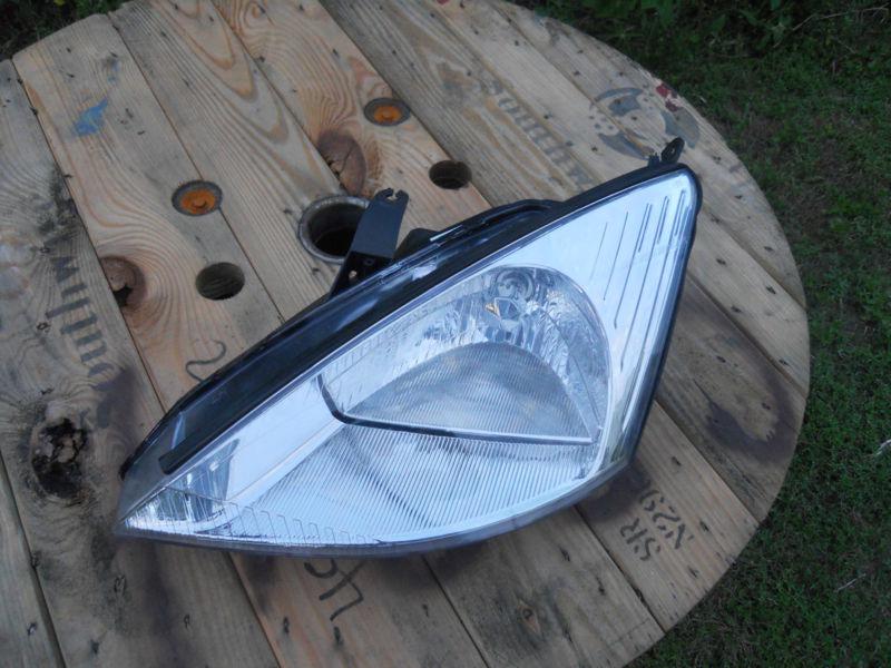 01 ford focus left headlight nice! 