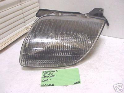 Pontiac sunfire 95-02 1995-2002 headlight driver lh left oe