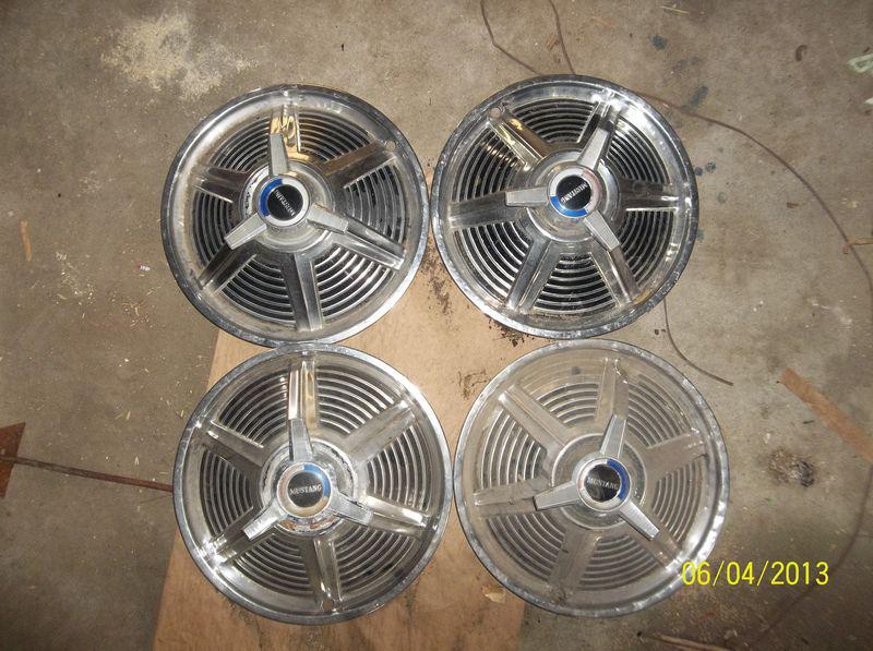 Vintage mustang hubcaps with spinner centers