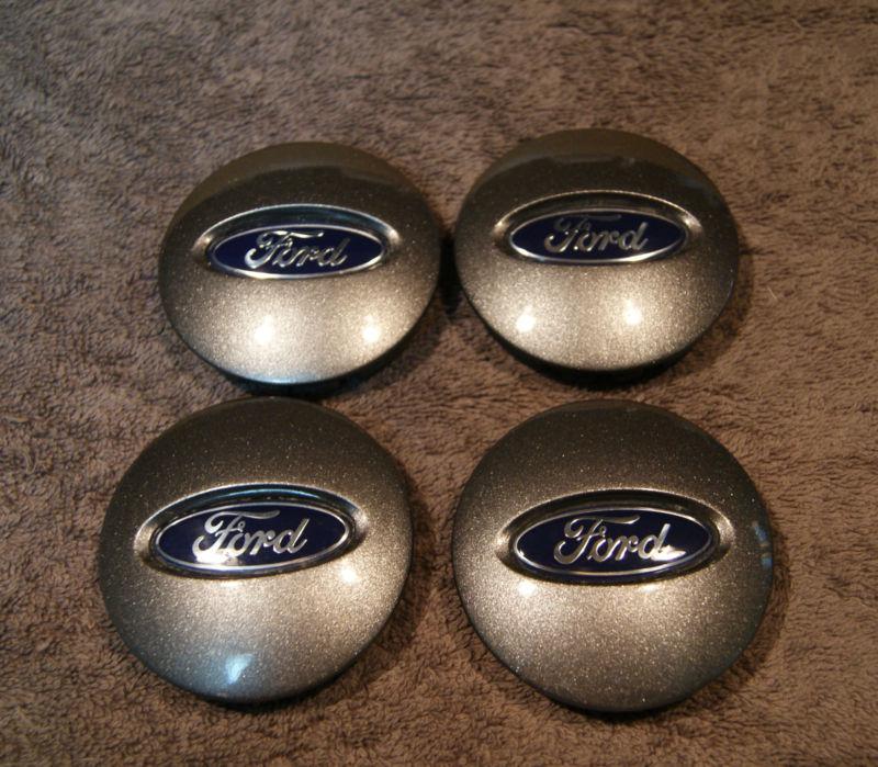  1 set of 4 ford f150 expedition center caps 