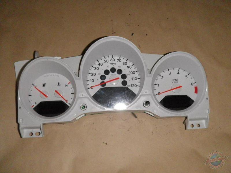 Cluster / speedometer caliber 663638 09 cluster 46k lifetime warranty