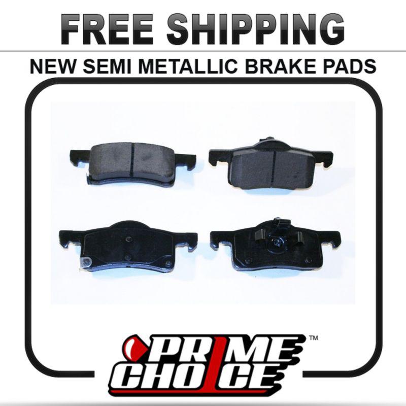 New premium complete set of rear metallic disc brake pads with shims