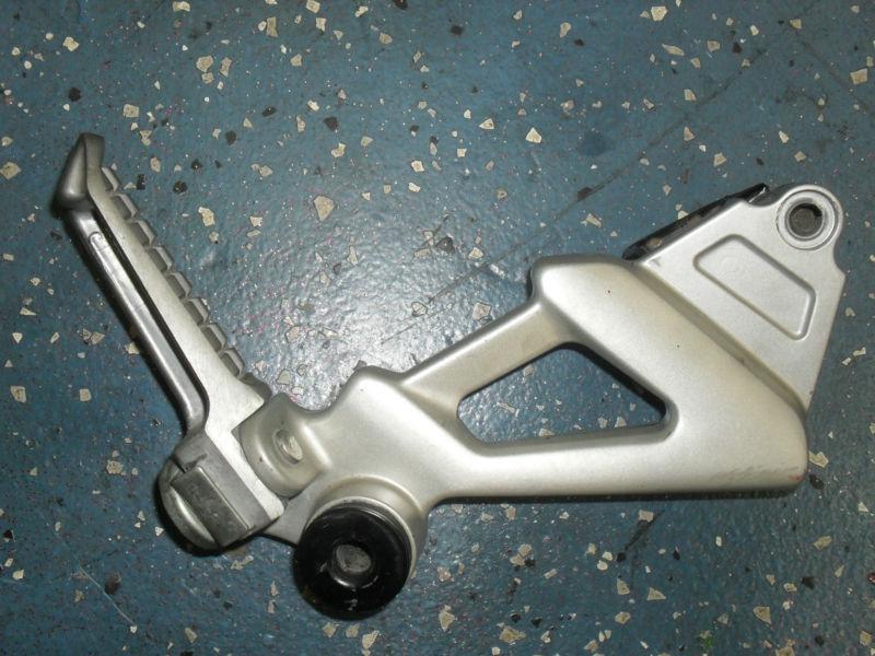 1994 kawasaki zx-11  right passenger footpeg bracket assy.   zx11-d 1993-2001