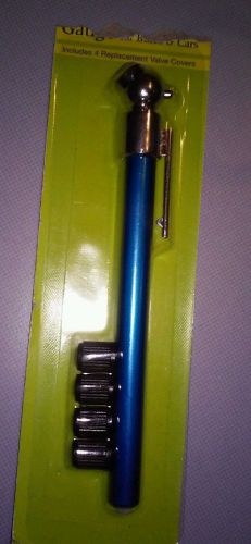 Tire pressure gauge including 4 replacement valve covers