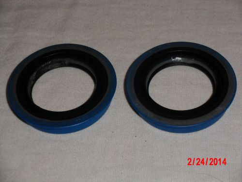 Chrysler / dodge / plymouth minivans left &amp; right front axle seals  4412522ab