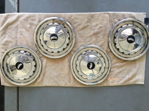 1957 chevy bel air hubcaps (x4)