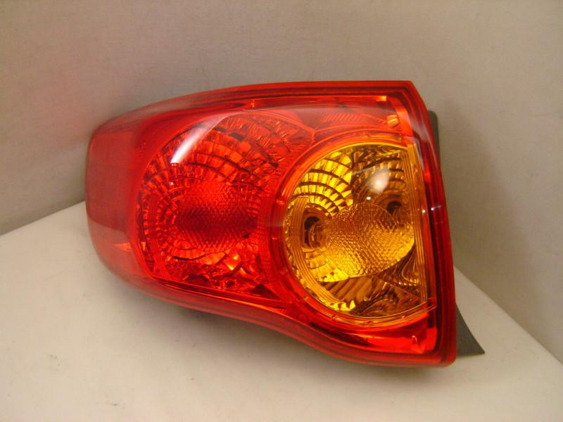 Toyota corolla left tail light 09 10 oem