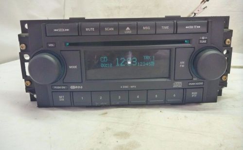 04-10 chrysler dodge jeep radio 6 disc cd mp3 player p05064010al ja4834