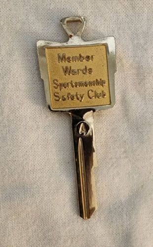 Vtg general motors brass key blank  sportsmanship safety club collectible patina