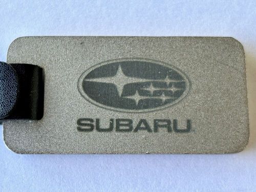 Subaru car keychain metal with black strap