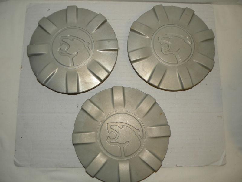 1993-1996 mercury cougar center caps, set of 3 , plastic,  oem