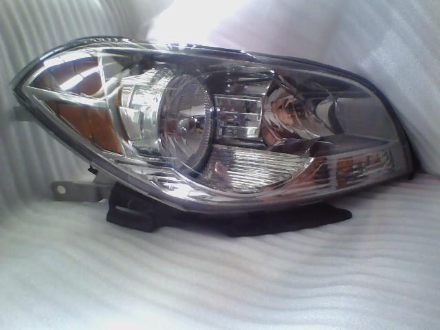  chevy  malibu right head light from a 2008 complete 