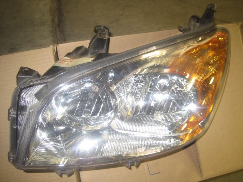 2008 toyota rav4  oem left driver side headlight 2006-2011