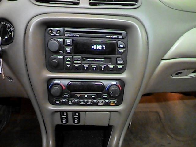 2000 oldsmobile intrigue radio trim dash bezel 2648811