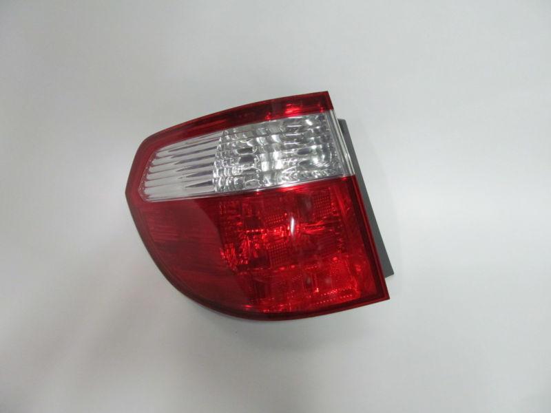 05 06 07 honda odyssey oem left tail light nice!