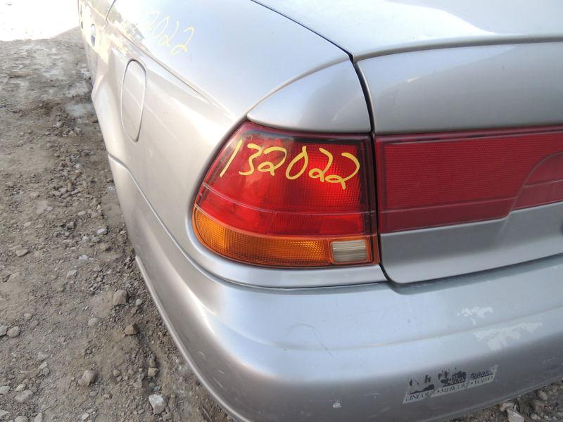 97 98 99 saturn s series sedan l. tail light sdn quarter panel mounted 427860