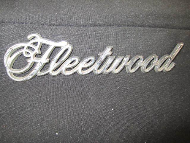 Cadillac fleetwood  emblem ornament " fleetwood " chrome plastic oe