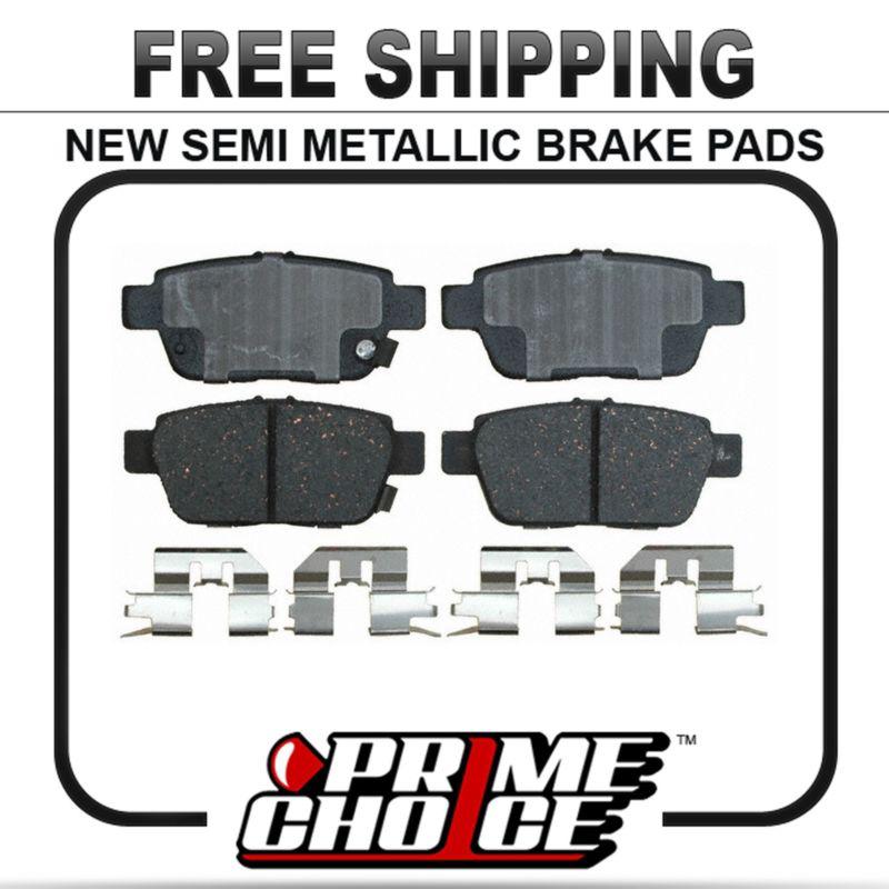 New premium complete set of rear metallic disc brake pads with shims