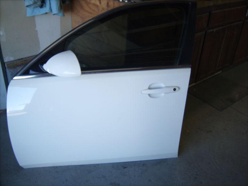 2010 chev impala driver side door, door panel, window, and hardware.